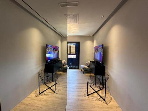 TV a/nebo společenská místnost v ubytování Here Hotel 宅這兒私宅-墾丁A宅