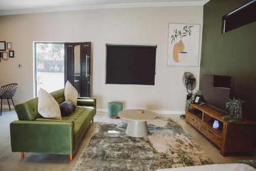 TV a/nebo společenská místnost v ubytování Welterusten Bij Kleine Schuur