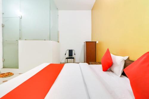 Ένα ή περισσότερα κρεβάτια σε δωμάτιο στο Hotel O Olive