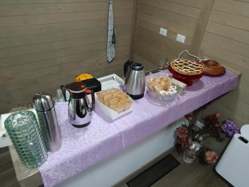 a table with pastries and other items on it at LE CERQUE in Spoleto