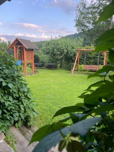 a gazebo and a playground in a yard at PEGAZOWA WOLA CISNA in Cisna