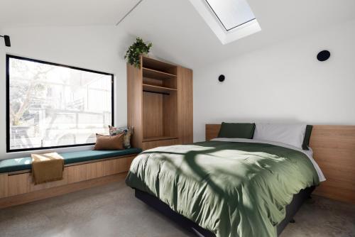 Postel nebo postele na pokoji v ubytování Bendigo Lodges
