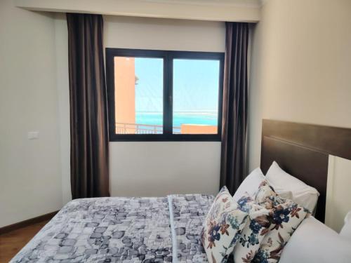Postel nebo postele na pokoji v ubytování Sea View Apartment
