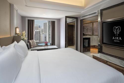 Postel nebo postele na pokoji v ubytování Aira Hotel Bangkok Sukhumvit 11