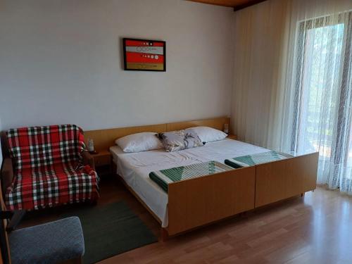 Postel nebo postele na pokoji v ubytování Apartments Vorkapic
