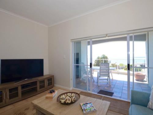 TV a/nebo společenská místnost v ubytování Kaalvoet Self-Catering Apartments