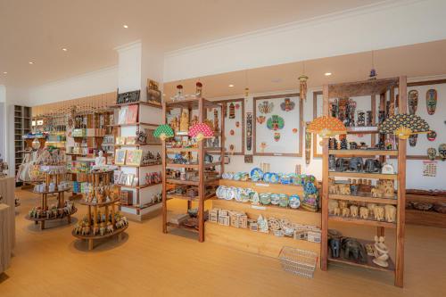 a store filled with lots of different types of items at Araliya Red - Budget friendly Hotel- Where you find stunning 360 panoramic view of Nuwara Eliya in Nuwara Eliya