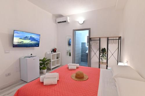 Postel nebo postele na pokoji v ubytování IzzHome City Heart Rooms