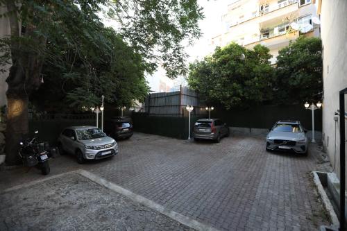 a group of cars parked in a parking lot at Opatija Hotel in Istanbul