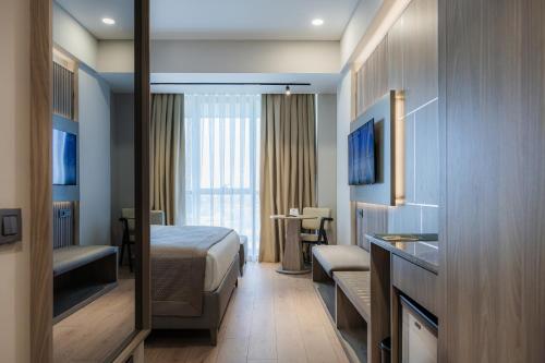 Televisyen dan/atau pusat hiburan di RENEX HOTELS