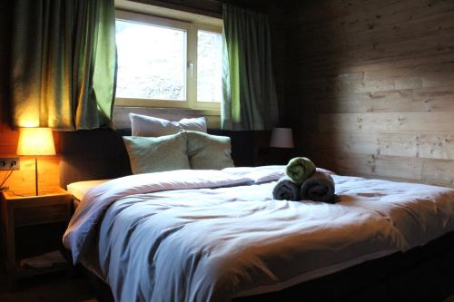 Postel nebo postele na pokoji v ubytování Plünggas Chalets