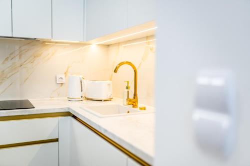 Dapur atau dapur kecil di Apartamenty Centrum Rewal