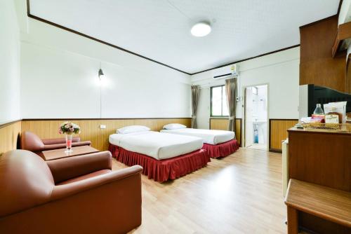 Ліжко або ліжка в номері Nice Palace Hotel