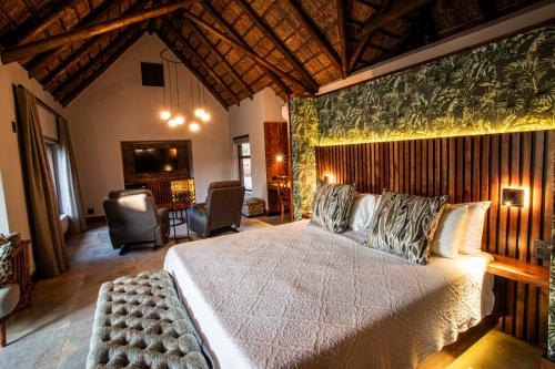 Ένα ή περισσότερα κρεβάτια σε δωμάτιο στο Lapeng Guest Lodge