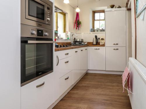 Dapur atau dapur kecil di Bwthyn Gwyn Ty'n Y Pant