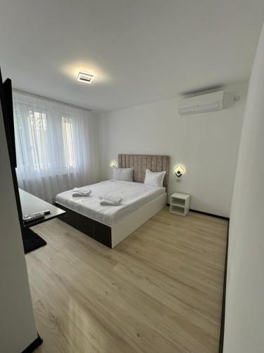 Кровать или кровати в номере Cazare Tecuci Relax House