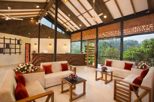 Area soggiorno di Amrezy Resort and Spa by Stride, Wayanad
