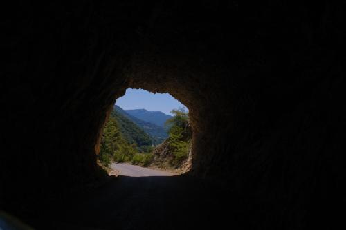 a view from the inside of a tunnel at 4NORTH Apartment17 in Pluzine