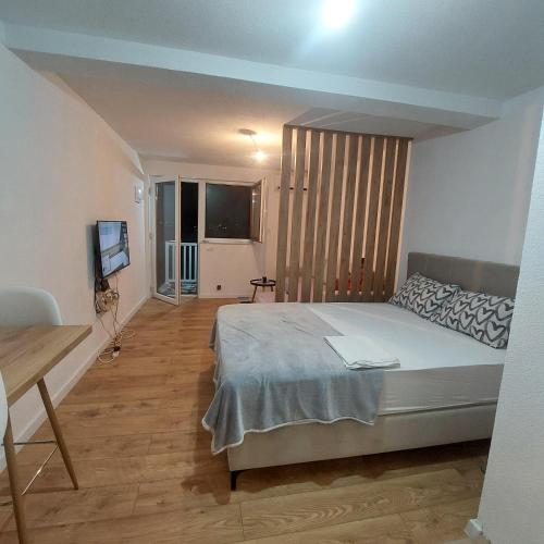 Ένα ή περισσότερα κρεβάτια σε δωμάτιο στο Apartment EnEm 2 Blagaj