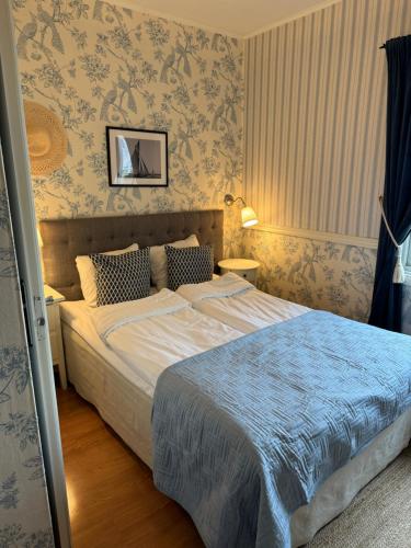 Voodi või voodid majutusasutuse Nautic Hotell toas
