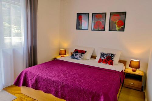 Ένα ή περισσότερα κρεβάτια σε δωμάτιο στο Apartments Anna II