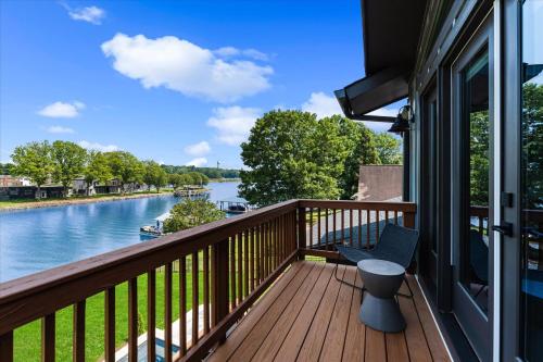 a balcony with a view of a river at Elysian Shores w/Heated Pool & Optional Boat Rental in Mooresville