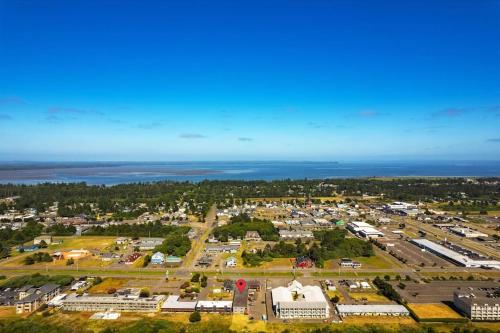 an aerial view of a parking lot next to the ocean at Salty Waves Condo in Ocean Shores