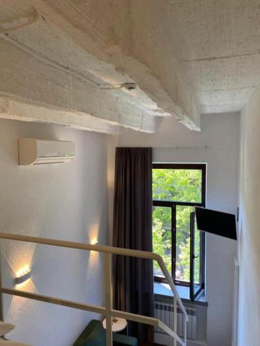 Lift Hotel Boutique - Derybasivskaにあるベッド