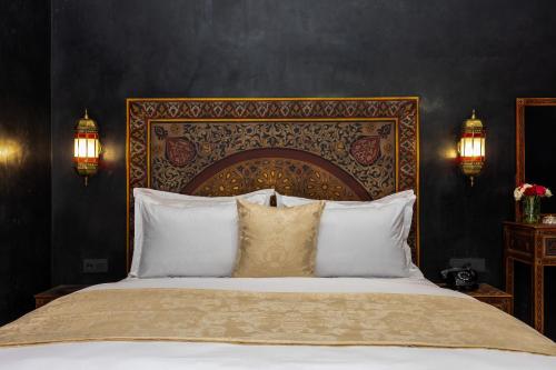 Postel nebo postele na pokoji v ubytování Alrashid Marrakech