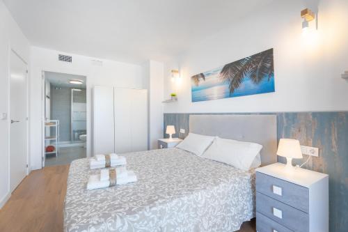 Katil atau katil-katil dalam bilik di Lopimar Playa Canet