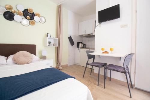 Postel nebo postele na pokoji v ubytování Studio Apartmani M