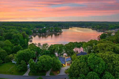 an aerial view of a lake at sunset at Nancy Key w/Pool, Wine Cave, Optional Boat Rental in Denver