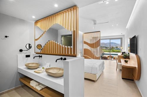 โทรทัศน์และ/หรือระบบความบันเทิงของ Ventale Island Breeze Resort