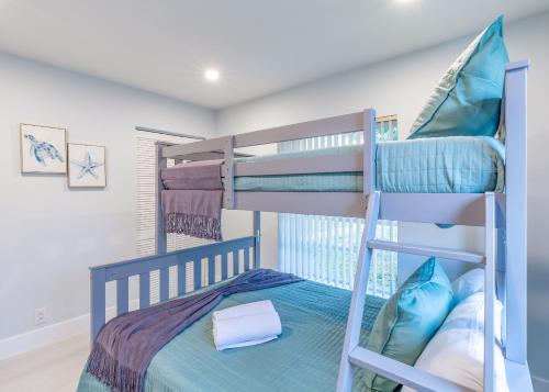 a bunk bed room with bunk beds in a house at Margate Retreat Pool Near Beach Bbq in Margate