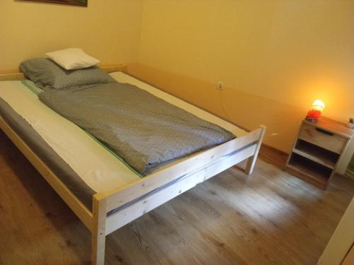 Posteľ alebo postele v izbe v ubytovaní Györgyök Háza