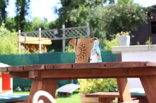 a pair of shoes sitting on top of a wooden table at Ca’Benvenuto in Doische