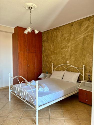 Posteľ alebo postele v izbe v ubytovaní "Twin Apartments" in Kyparissia