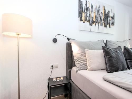 Postel nebo postele na pokoji v ubytování Apartment Am Birkenhain-3 by Interhome