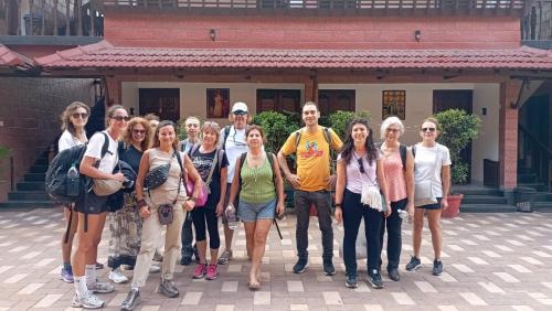 a group of people standing in front of a building at ARONIC beach hotel in Varkala
