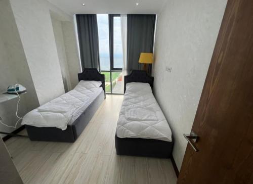 Katil atau katil-katil dalam bilik di Novel hotel