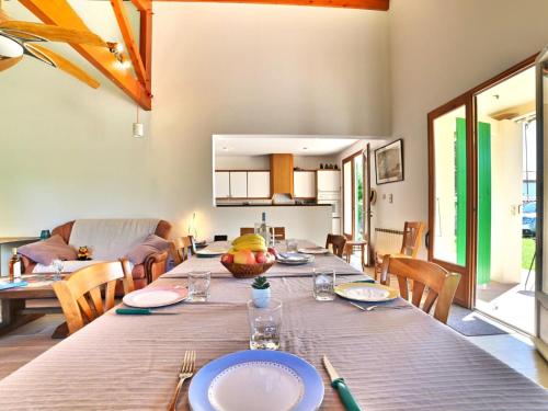 a dining room with a long table and chairs at Holiday Home L'Horizon A by Interhome in Saint-Denis-dʼOléron