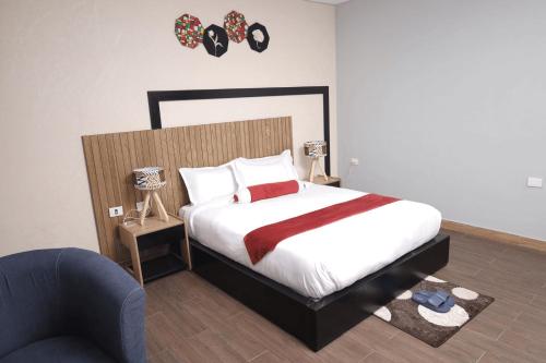 Ένα ή περισσότερα κρεβάτια σε δωμάτιο στο Fenet Hawassa Hotel