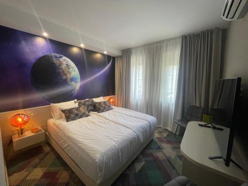 Un ou plusieurs lits dans un hébergement de l'établissement Science Hotel