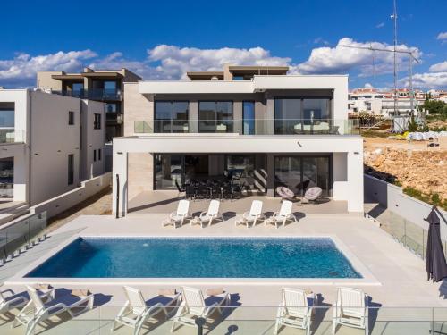 Πισίνα στο ή κοντά στο Luxury Villas Paradise