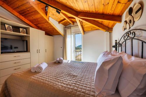 Postel nebo postele na pokoji v ubytování Ionian Serenity House