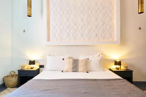 Postel nebo postele na pokoji v ubytování Riad Miloud en exclusivité 10 P au cœur de la Médina
