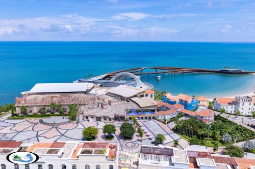 an aerial view of a city with a bridge over a body of water at Oscar Seaview Apartment in Phu Quoc