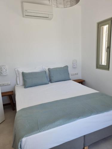Ένα ή περισσότερα κρεβάτια σε δωμάτιο στο Anemone III house w Private Pool 5 minute from beach