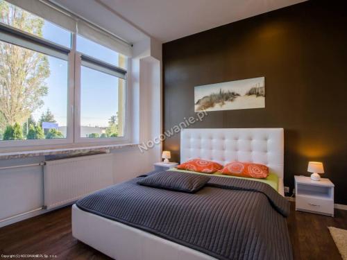 Postel nebo postele na pokoji v ubytování VillaMaria