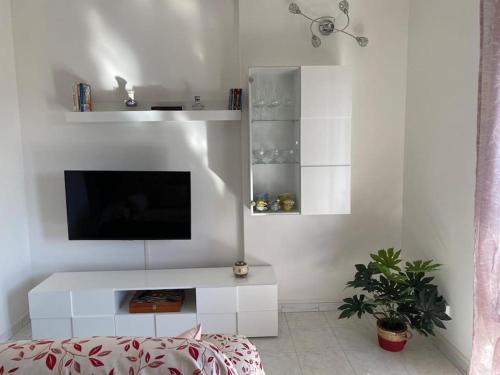 Μια τηλεόραση ή/και κέντρο ψυχαγωγίας στο Casa Vacanze Quartu Sant'Elena